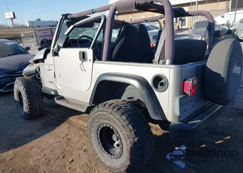 2000 Jeep Wrangler Sport z USA, uszkodzony, nr VIN 1J4FA49S2YP738494